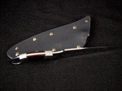 USMC "Bulldog" tactical combat knife, spine edgework, filework detail.