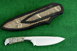 "Cygnus ST" reverse side view. Sheath has full panel inlays of Cobra skin in back and belt loop.