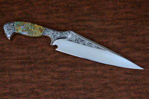 "Malaka" fine custom handmade knife, reverse side view  in hand-engraved CPM 154CM powder metal technology stainless steel, T4 deep cryogenically treated, bolsters of hand-engraved 304 stainless steel, Plasma agate and Nephrite Jade gemstone handle, hand-carved leather crossdraw sheath with stainless steel hardware