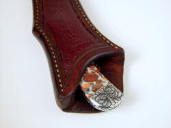 "Trifid" sheath mouth detail. Heavy sheath protects knife with beauty. 